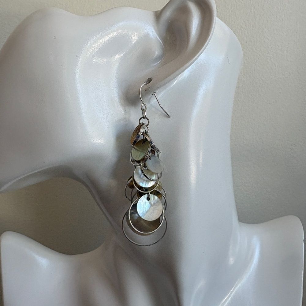 Fashionable iridescent shell discs layered earrings